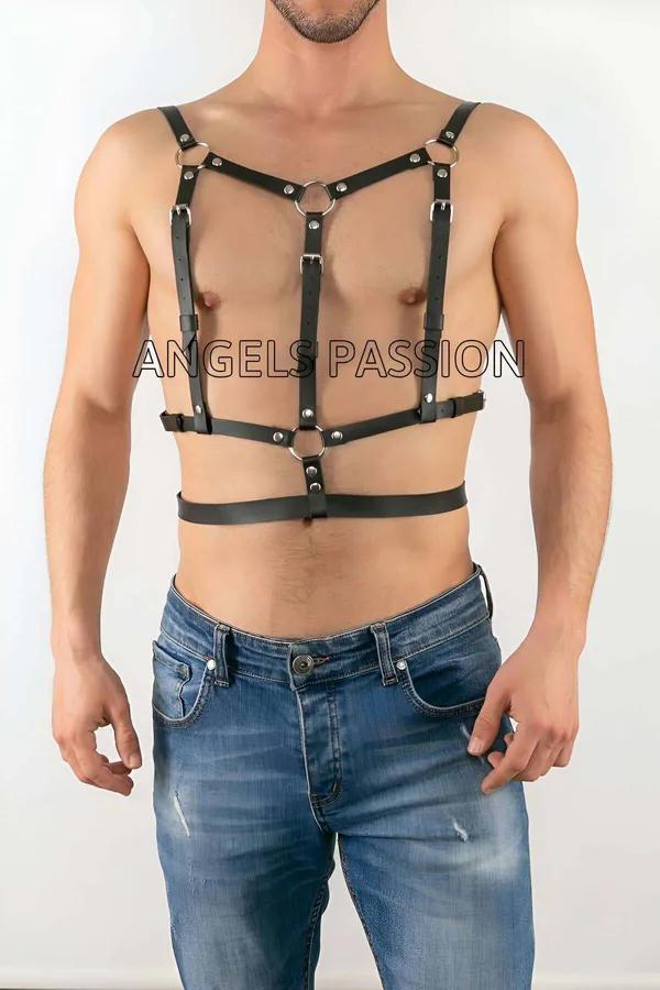 black faux leather body harness with dual silver O-rings and six snap studs worn over bare male torso